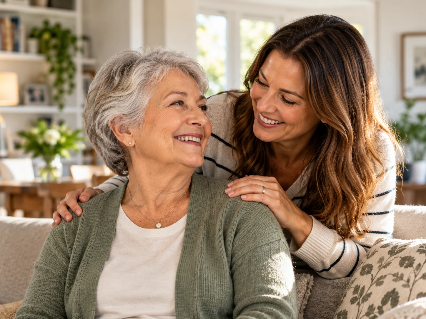 Older mother and adult daughter sharing time at home